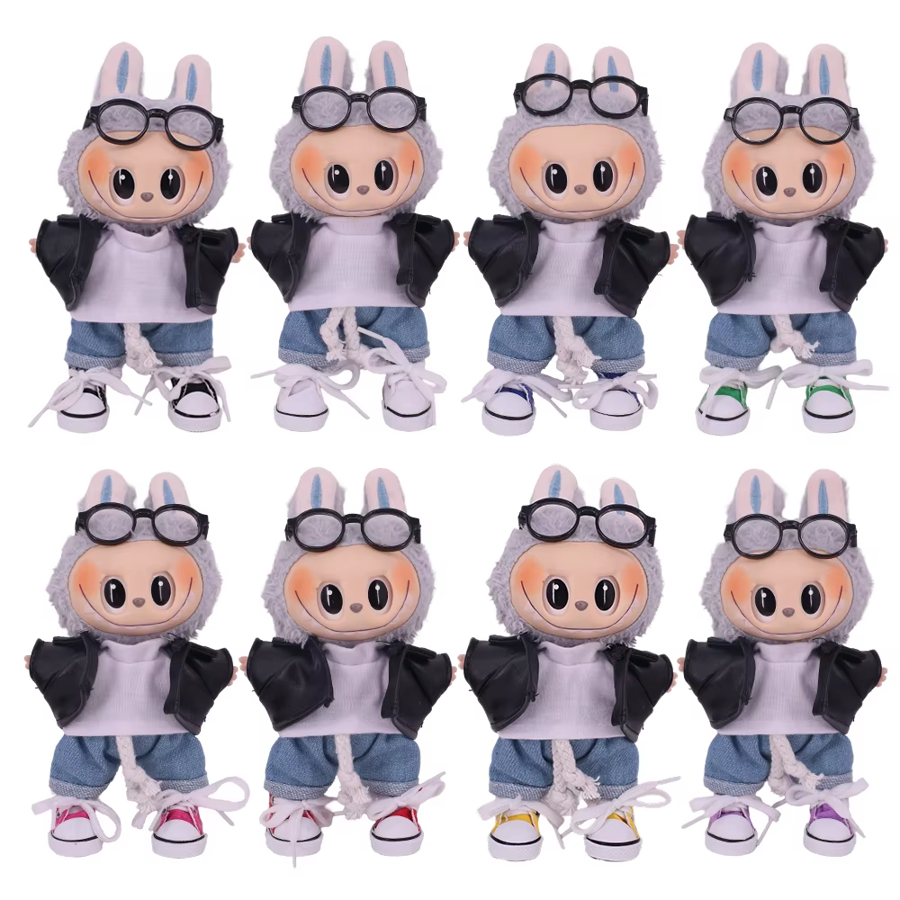 Around our doll’s feet we find microcool-boy rainbow sneakers, the sort that pop on and pop off more easily than charm, and a petite cosmos of K-pop plushies - Image 4