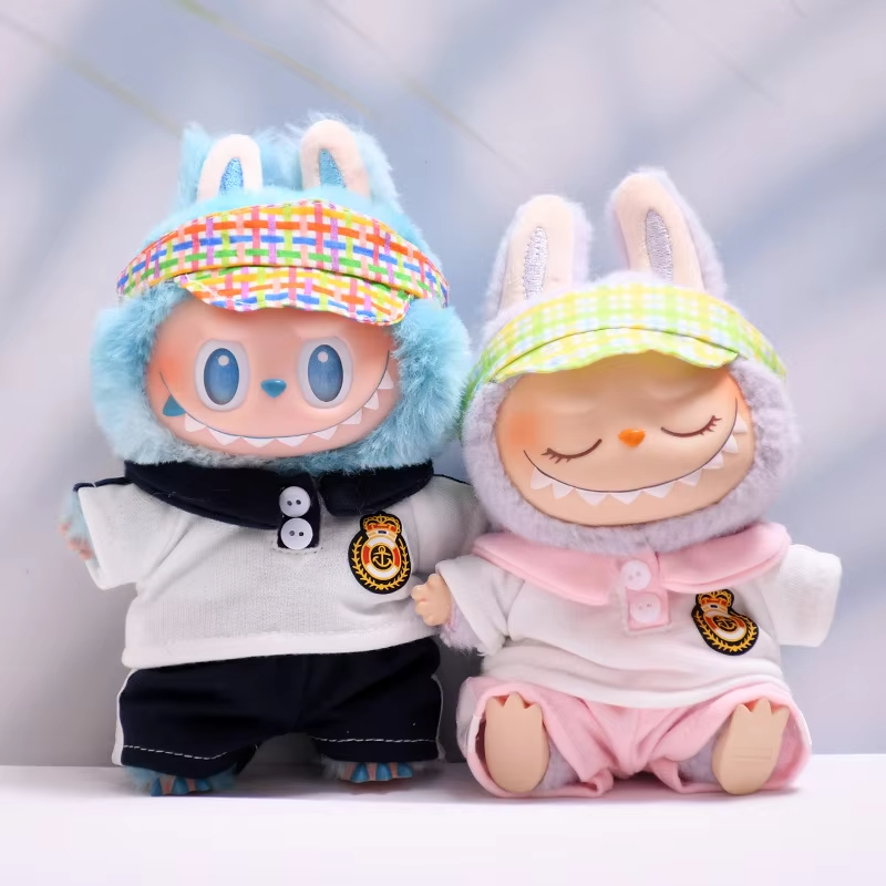 The matching Monster outfit Accessory Set shines as an inspired graduation surprise for youngsters, lacing the Labubu 15–17-centimeter collectible with understated flair