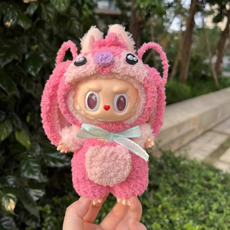 Dress up your collection with the Labubu Clothes 17cm accessory: a petite, pastel pink nod to Stitch, handcrafted to delight Labubu fans everywhere - Image 3