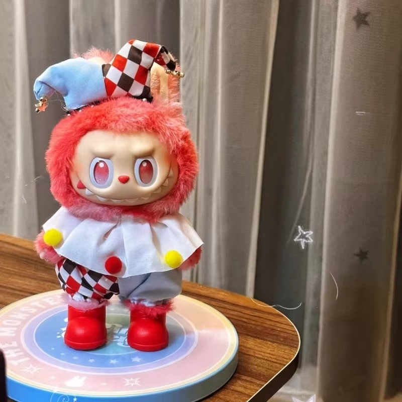 Take a trip to pastel carnival land with the Macaron-Colored Circus Clown Outfit, made from the fluffiest dream of cotton and sprinkled with whimsy