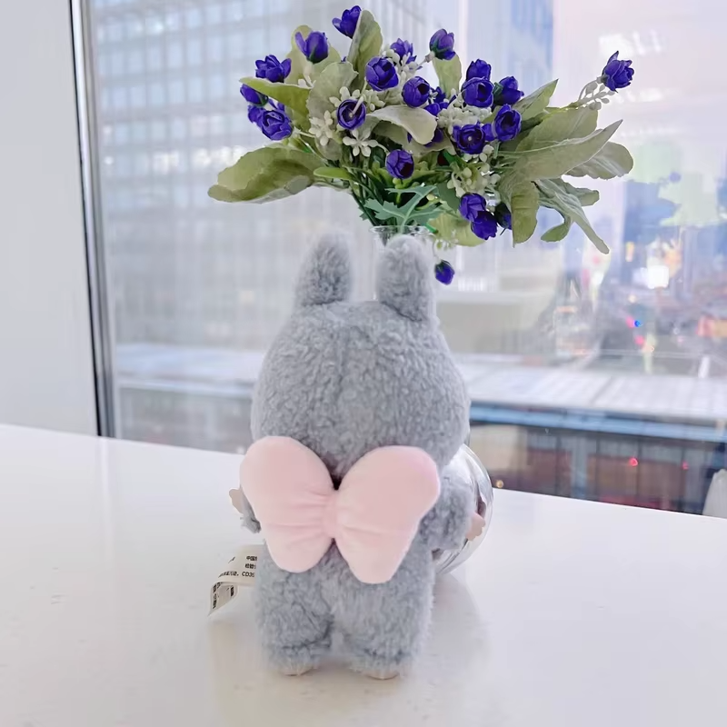 A sparkling new micro accessory for Labubu dolls—tiny bows meant to crown your fave outfits and matching hoodies—now completes the style story with pure sweetness. - Image 4